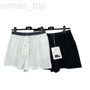Diseñador de pantalones cortos para mujeres Chan New Letter Weaving Cinturón de bolsillo de cintura informal con cubierta de entrepierna y adelgazamiento de la pole pole de aceite surgativo S8DU