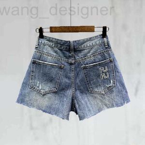 Damesshorts ontwerper Vroege lente damesshorts mode briefborduurwerk verontruste gewassen denimbroek dames blauwe A-lijn hotpants TSWO