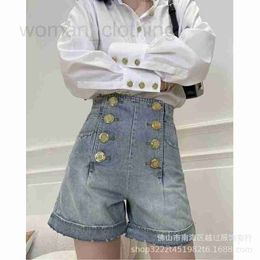 Shorts pour femmes Designer lavé et fabriqué vieux bouton à double rangée design décoratif taille haute short en jean en dentelle pour les femmes en été XRBF