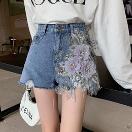 Short femme Hzirip 2021 Sexy été femmes bouton jean Denim mode broderie décontracté taille haute tout-match ample dames