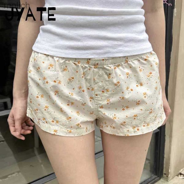Shorts pour femmes shorts de bouton imprimé floral orange pour femmes pour femmes Nouvelles hautes taies occasionnelles de rue.