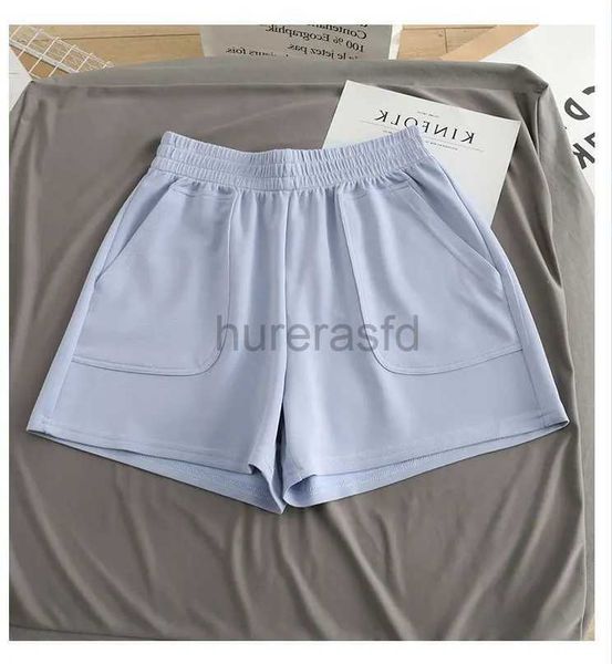Short féminin Shorts de maison de la couche d'air soyeuse pour les femmes Summer Style coréen lâche mince pantalon chaud de sports cool décontractés D240426