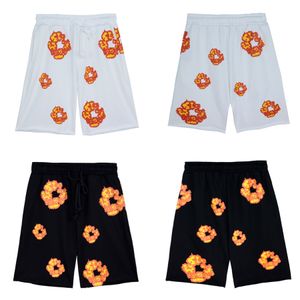 Pantalones cortos para mujer, pantalones informales para hombre nuevos de primavera y verano, estampado de flores de llama versátil