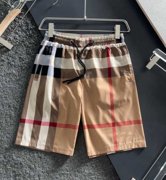 Shorts pour femmes Shorts d'été pour hommes et femmes version pantalon décontracté du populaire cinquième pantalon à carreaux à la maison portent des pantalons de plage amples