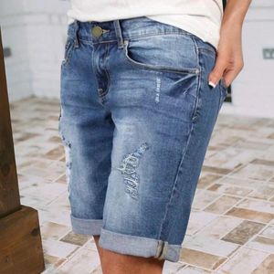 Short féminin Summer Sexy Jeans High Taist Slim Flming Trou avec des poches décontractées de denim en vrac