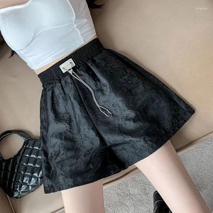 Modèle de texture de short pour femmes style chinois pour l'été haute jambe larges et pantalon a-ligne noire minceur