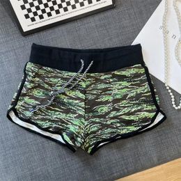Pantalones cortos para mujeres al estilo coreano sexy camuflage estampado deportivo de verano en la cintura alta de la cintura delgada de la pierna ultra corta pantalones de yoga de pierna ancha