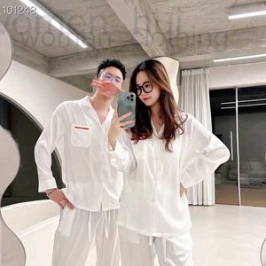 Femmes Sleep Lounge Designer Pantalons de couleur unie manches longues pyjamas minces femmes et hommes printemps automne tendances de la mode couple de soie vêtements de maison ensemble 583I