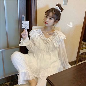 Vêtements de nuit pour femmes Lolita Princesse Blanc Pyjama Ensemble Femmes Dentelle Volants Broderie Deux Pièces Costume À La Maison Doux Rayé Pyjamas Crochet Bow 230310