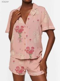 Vêtements de nuit pour femmes Nouveaux femmes de pyjama 2 pièces mignonnes mignonnes bouton à manches courtes top + shorts set vêtements à la maison