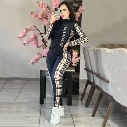 Ropa deportiva de mujeres 2024 Nuevo diseñador impreso a cuadros letras de cardigan de lujo para mujeres set de 2 piezas