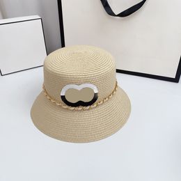 Dames lente/zomer ontwerper emmer hoed vakantievakantie zonbescherming, zonneschade, ademende metalen ketting strohoed