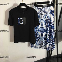 Damespak meisjessets damesjurk 2 stuks T-shirt en blauw en wit porselein bedrukte rok Zomer Gratis verzending Maat S-XL Nieuw binnen Mar14