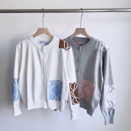 Suéter de mujer 65357 Cárdigan de algodón de gran elasticidad suéter suave suéter de manga larga otoño raya con cuentas carta manga larga jersey doble botonadura