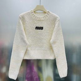 Suéteres de mujer otoño invierno nuevo estilo Elite prendas de punto de cuello redondo moda cuentas ajustado manga larga suéter corto para mujer