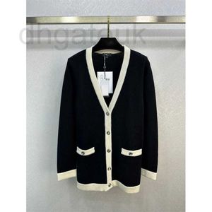 Damessweaters designer merk 2024 vroege lente nieuw een Britse stijl dubbele zak enkele rij knopen zwart en wit contrasterend gebreid vest met V-hals GMJ7