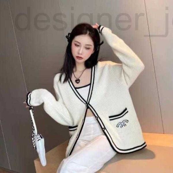 Pulls pour femmes Designer explosif luxe mode haute version de petit vent parfumé début automne aiguille grossière jacquard fil noir et blanc tricot 6T84