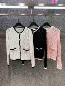 Chandail de chandails pour femmes Nouveau Spring Suern Tricoted Sweater Femme Cardigan O-cou simple Poit