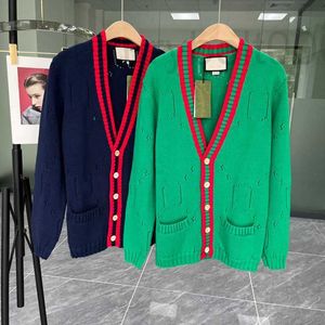 Dames truien Designer Spring 2022 Nieuwe vaste V-hals één rij knop losse casual pocket wol gebreide vestjacht vrouwen nova