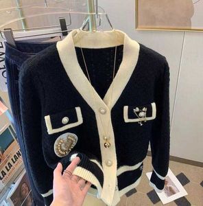 Damestruien Luxe ontwerper van hoge kwaliteit O-hals vest Chan-sweater Jassen Mode-vlinderdas-sweaters