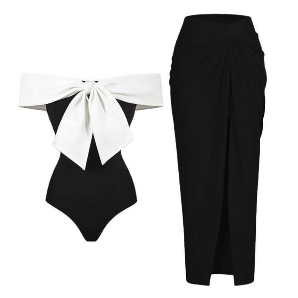 Swimons de maillots de bain pour femmes Bikini en noir et blanc à une seule pièce Slim Fit Open-Back Bow Design Swimsuit Women Elegant Stracles Couvre T240523