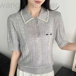T-shirt Femme Designer Chunyuan 24 Début du printemps Nouveau élégant Pearl Edge Polo Col Laine Jacquard Pull tricoté à manches courtes pour femmes 4VWQ