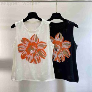 T-shirt pour femmes concepteur lourd industrie à paillettes brodées en tricot à fleur en tricot pour les vêtements pour femmes gilet de laine petit