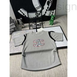 T-shirt Femme Designer LuxuryCE Printemps / Été Nouvelle lettre broderie épaule bloc de couleur petit design mode polyvalent tricot lâche XHXM