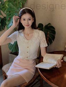T-shirt pour femmes Shenzhen Nanyou haut de gamme Miu Home Gentle and Pure Désir Style Perle Button Decoration Apricot Flip Neck Col Short Shirt Oyfj