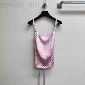 T-shirt de t-shirt pour femmes Nouveau produit Small Fragrant Pink Open Back Top Top avec Sangle Suspende Malon Jupe pour femmes Mao5