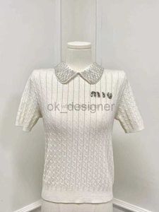 T-shirt en t-shirt pour femmes Offre douce au début du printemps Miu Style Poll Coul blanc T-shirt en tricot en tricot à ongles