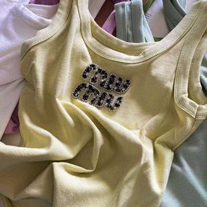 T-shirt de t-shirt pour femmes Tee Summer Miui Nail Perle LETTRE INDUSTRIE HEAUX ROPIRATION VIET NOUVEAU SALAIRE SUJETS SUPPENSE