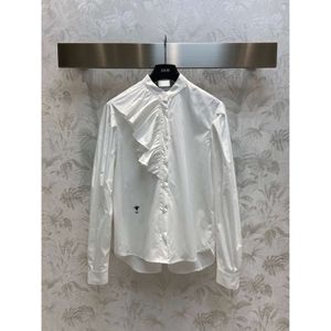 T-shirt féminin au début du printemps à volants Little Bee Broicty Shirt White avec des manches à bulles d'âge réduites pour un style polyvalent mince