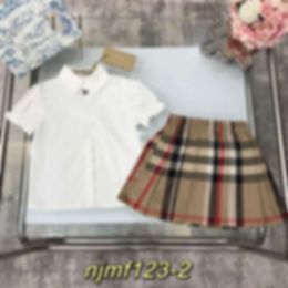 Camiseta para mujeres Set de dos piezas para niñas con camisa de cuello de polo grande Falda plisada de cuadros Pure algodón interno para estilo académico