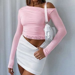 T-shirt pour femmes Sexy Tees Spring Instagram Instagram Nouvelle couleur de couleur unie à manches longues plissées à manches longues plissées ouvertes T-shirt pour femmes plus taille