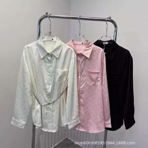 T-shirt pour femmes printemps / été de style yujie lisse jacquard avec une série de chemises de chaîne de taille lâche