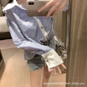 Dames t-shirt zomer Koreaanse editie kleine geurige wind kleurrijke stip verticale balk gesplitste manchet boog lange mouwen shirt