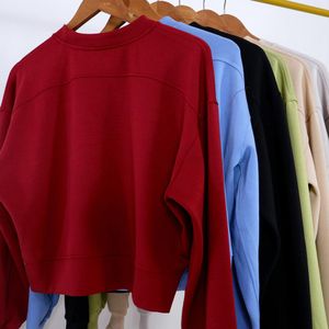 T-shirt féminin t-shirts Sweater court pull en vrac Suit de yoga polyvalent