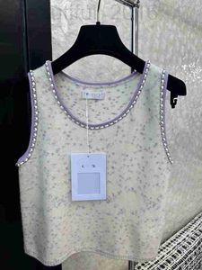Chars pour femmes créatrices de camis début automne cha laine laineuse de l'industrie lourde chaîne en cuir portant la mode et l'élégance du cou rond polyvalent