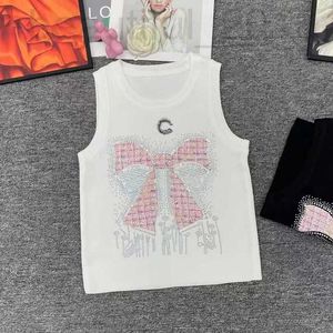 Chars pour femmes concepteur de camis Xiaoxiang industrie lourde papillon rose papillon chaud en diamant tissu rond du cou rond
