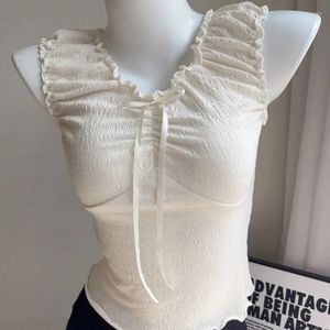 Débardeurs pour femmes Halter à l'intérieur des hauts femme printemps bord de fleur laçage doux abricot gilet court été sans manches beige col en V petit haut femme