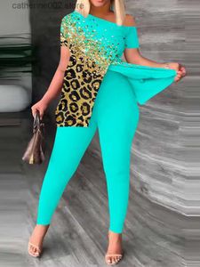 Survêtements pour femmes 2023 nouvel ensemble de deux pièces de mode pour femmes grande taille foi imprimé géométrique ourlet fendu haut pantalon ensemble survêtement quotidien T230605