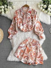 Suits-survêtements féminins 2024 Fashion Pisse en deux pièces set Femme Femme Spring Summer Luxury Print Shirts Blouses et Shorts vintage Socialite