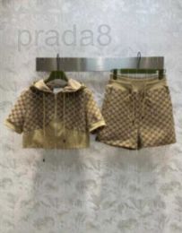 Survêtements pour femmes Designer à capuche à manches courtes Haut en jacquard Cordon de serrage Short taille haute Coupe à capuche associée à des shorts Super Slim et polyvalent 623 XAXJ