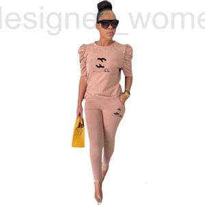 Dames tracksuits Designer Sexy Club Party Hollow Out Zie door 2 -delige pant matching set vrouwen Turtleneck Shirt Tops Leggings Skinny Outfit For Woman Two