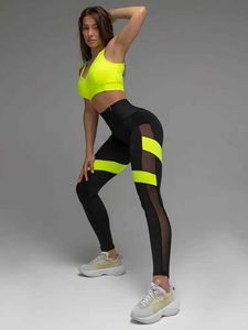 Suits-survêtements pour femmes Gymdolphins pour femmes Sports Sports Bra Skinny Patchwork Mesh High Leggings Leggings Fitness Set 2024 Spring Summer New Y240426