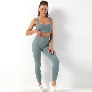 Conttures de survêtement féminines Derger les vêtements de yoga sans couture Set Sorging Absorbing Sports Bra Yoga Vest Yoga Pants Pantalon Fitness 240424