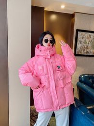 Frauen Trenchcoats Bonbonfarbene Baumwolle gepolsterte Kleidung 2023 Winter Koreanische Version Mit Kapuze Daunen Baumwolljacke Lose Brot Ins