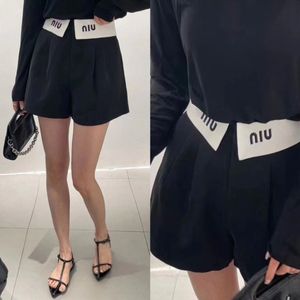 Shorts color block de cintura alta con bordado de letras y logo vuelto para mujer SMLXL