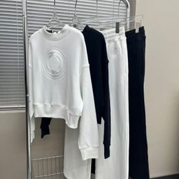 Pantalones de manga larga de dos piezas para mujer Chándal de diseñador Ropa deportiva de dos piezas para mujer Conjunto de jersey con letras dobles Proceso de estampado Ropa casual Sudadera